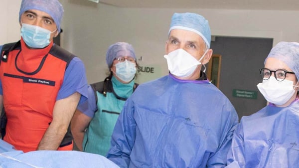 Doctors in operating theatre